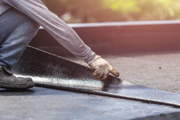 Professional Basement Waterproofing technician working in Fletcher, OH